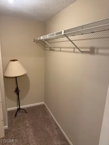 a view of a room with rack on the wall