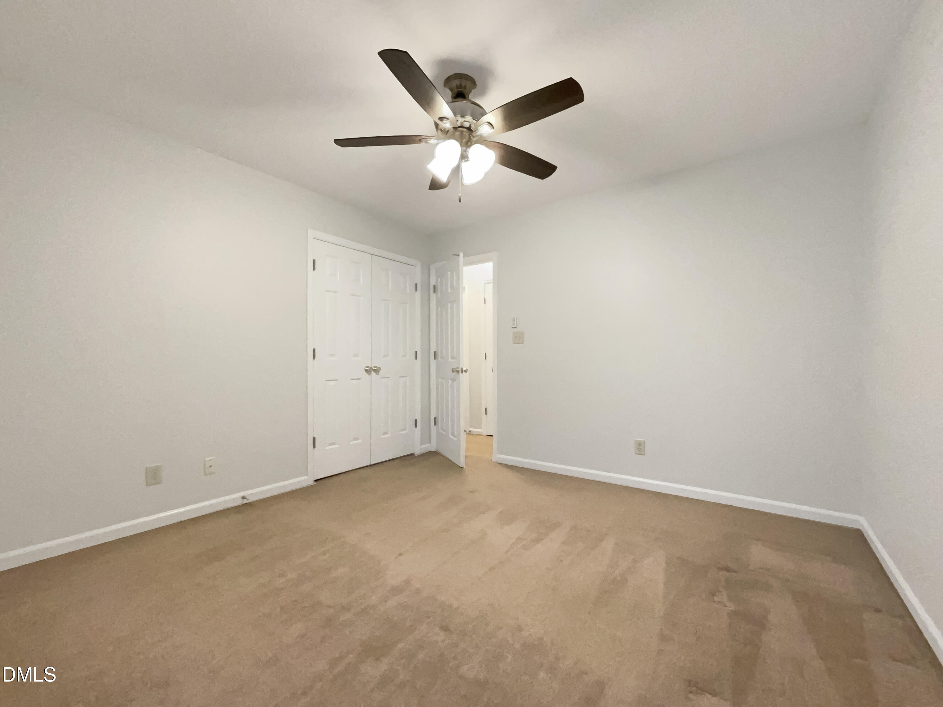 3257 Alforodo Street Fayetteville, NC 28306 - Photo 12 of 18 an empty room with closet and ceiling fan