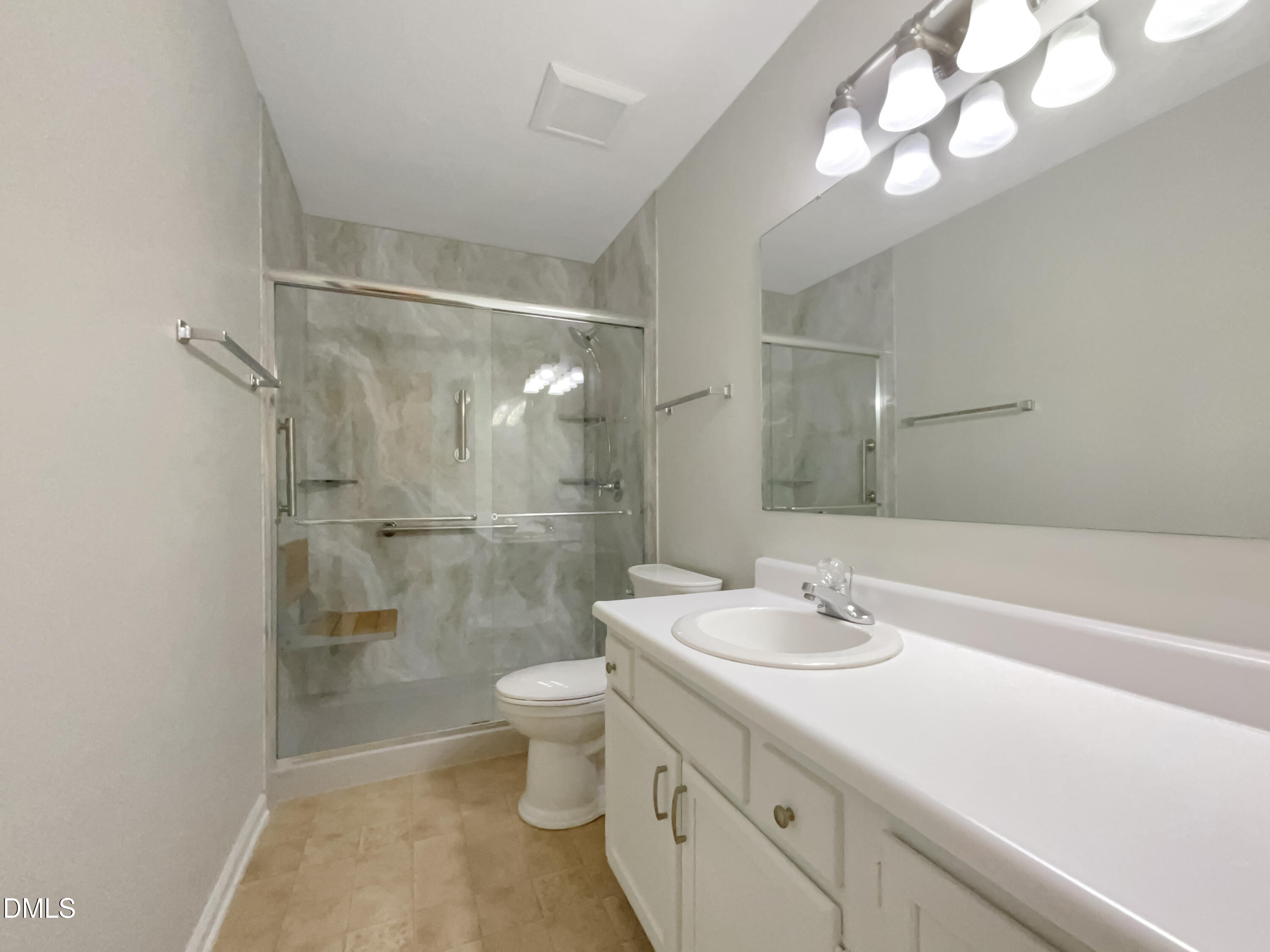 3257 Alforodo Street Fayetteville, NC 28306 - Photo 16 of 18 a bathroom with a sink a toilet and shower