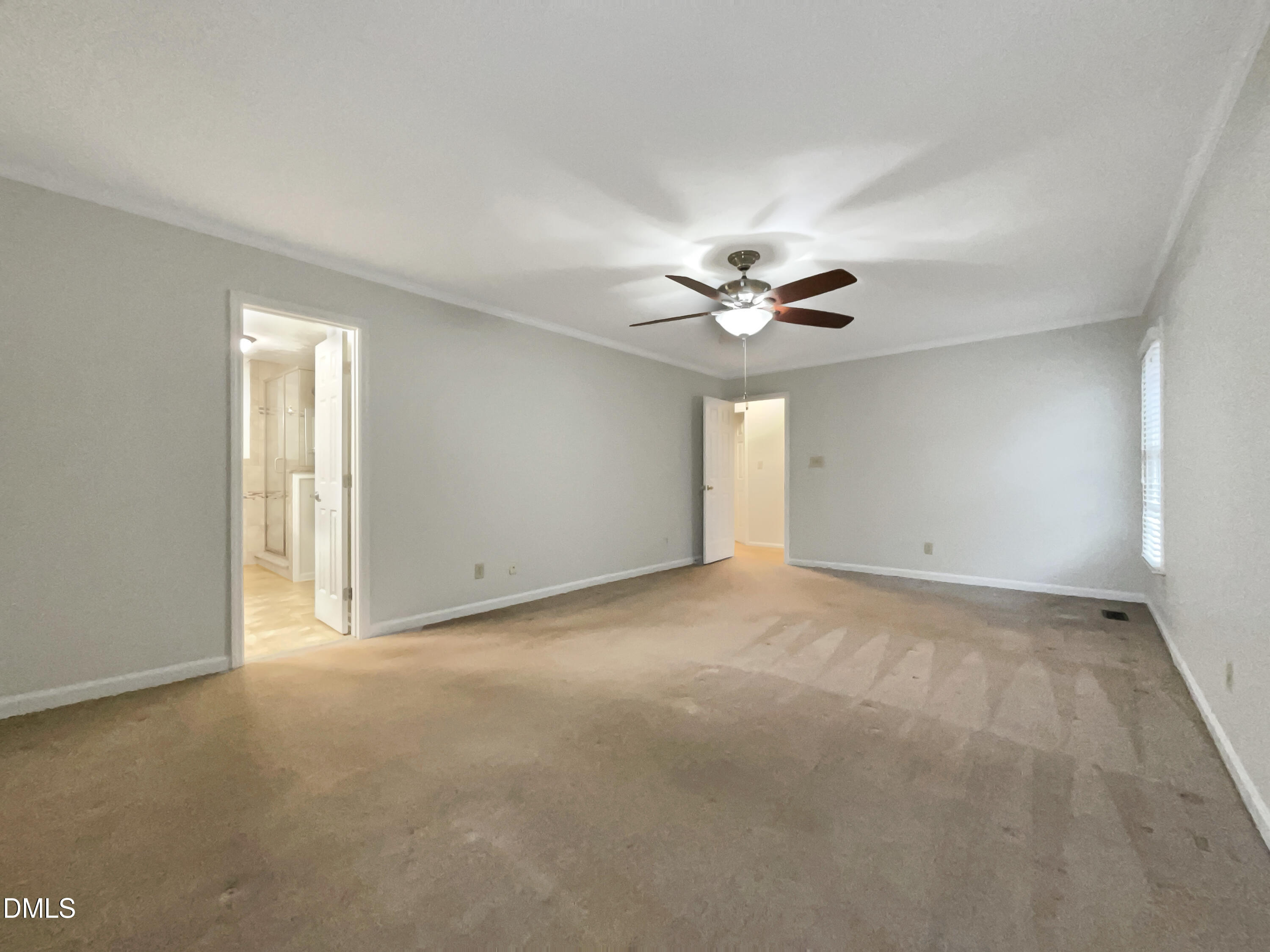 3257 Alforodo Street Fayetteville, NC 28306 - Photo 9 of 18 a view of an empty room with a chandelier fan