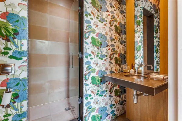 a bathroom with a bathtub and shower curtain