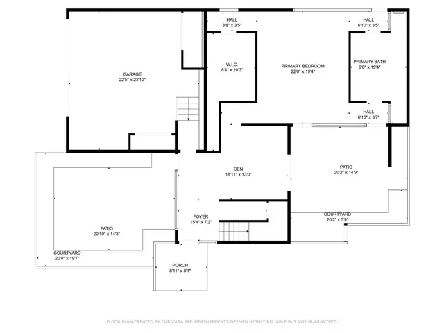 a picture of a bench in front of a wall