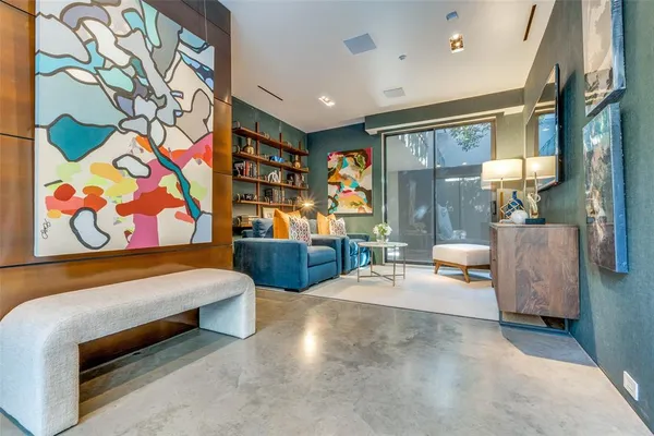 a view of game room with window and couch