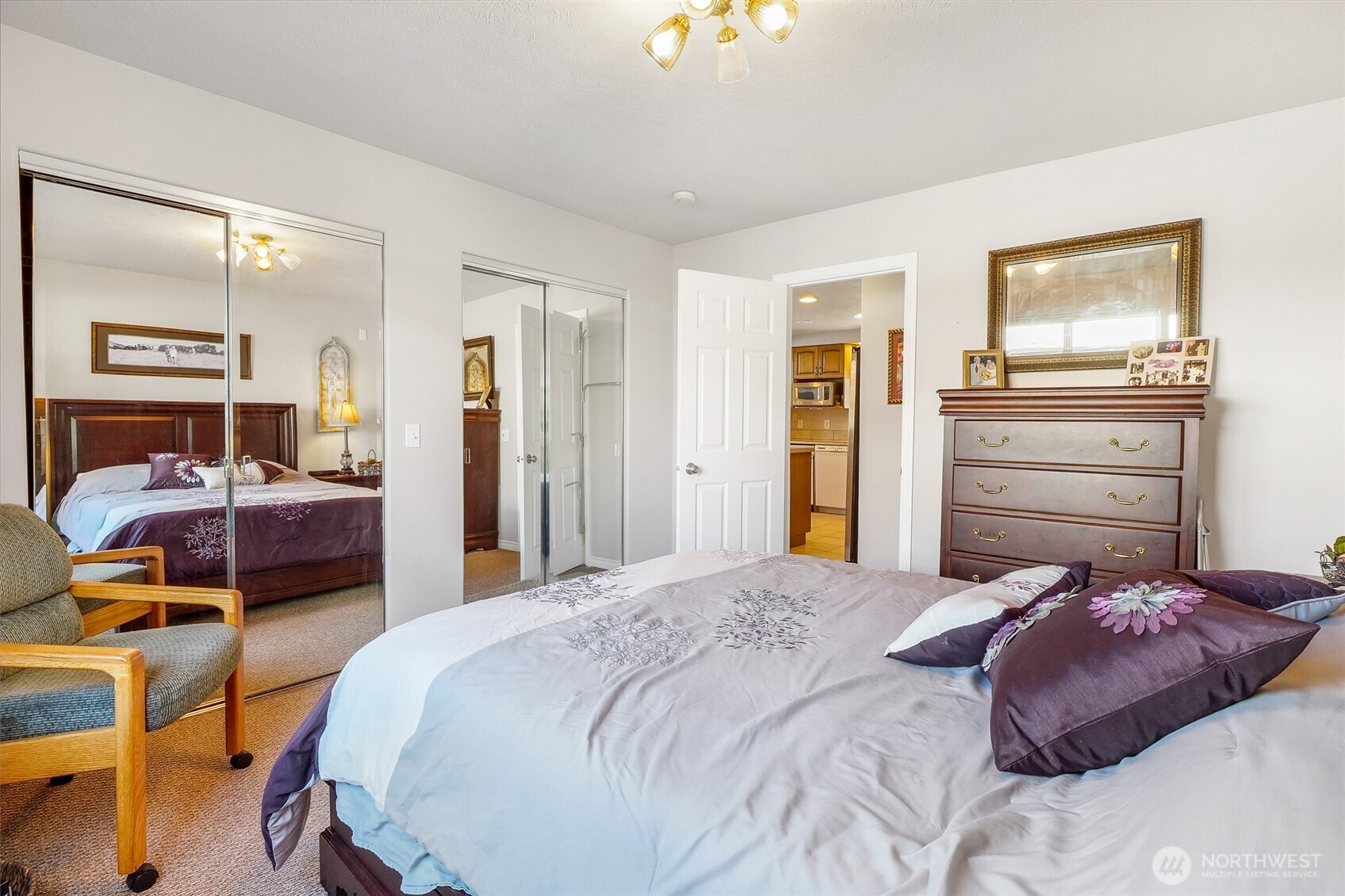 45220 Rantz Park Lane North Wilbur, WA 99185 - Photo 19 of 39 a bedroom with a bed and wooden floor