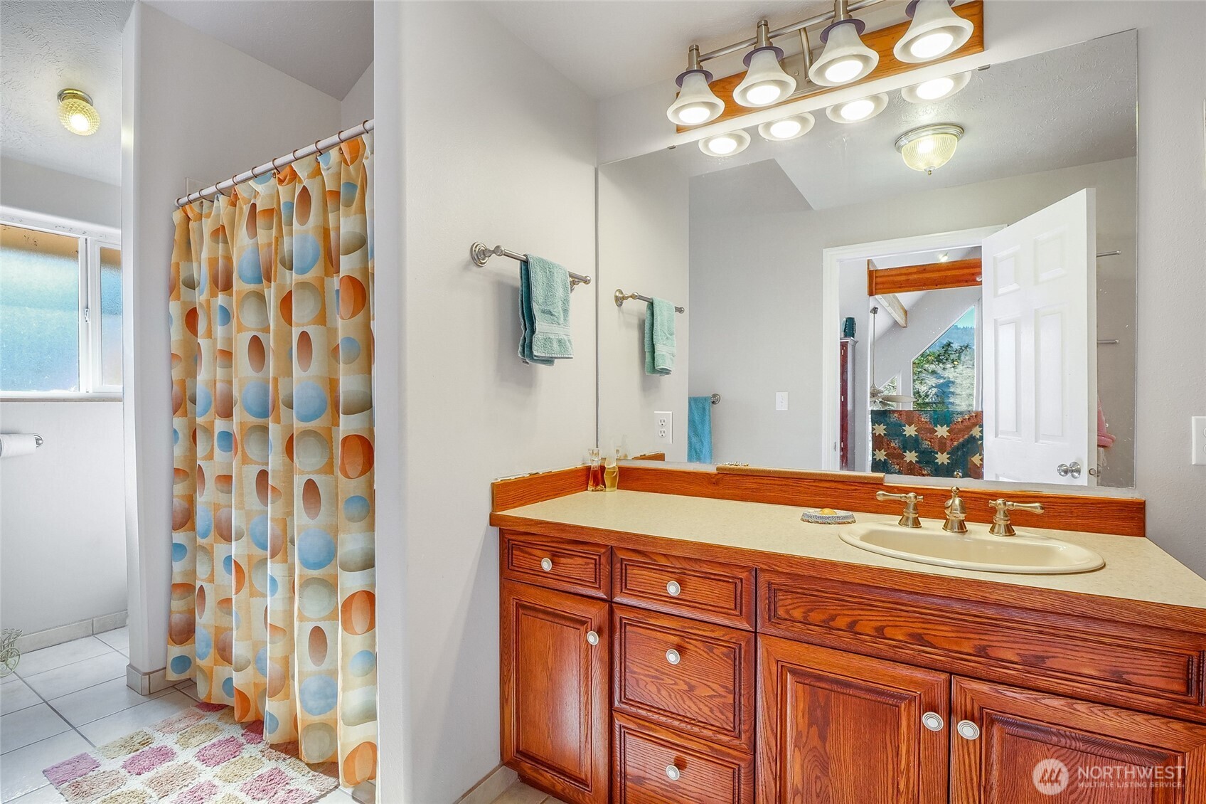 45220 Rantz Park Lane North Wilbur, WA 99185 - Photo 25 of 39 a bathroom with a sink a vanity and a mirror