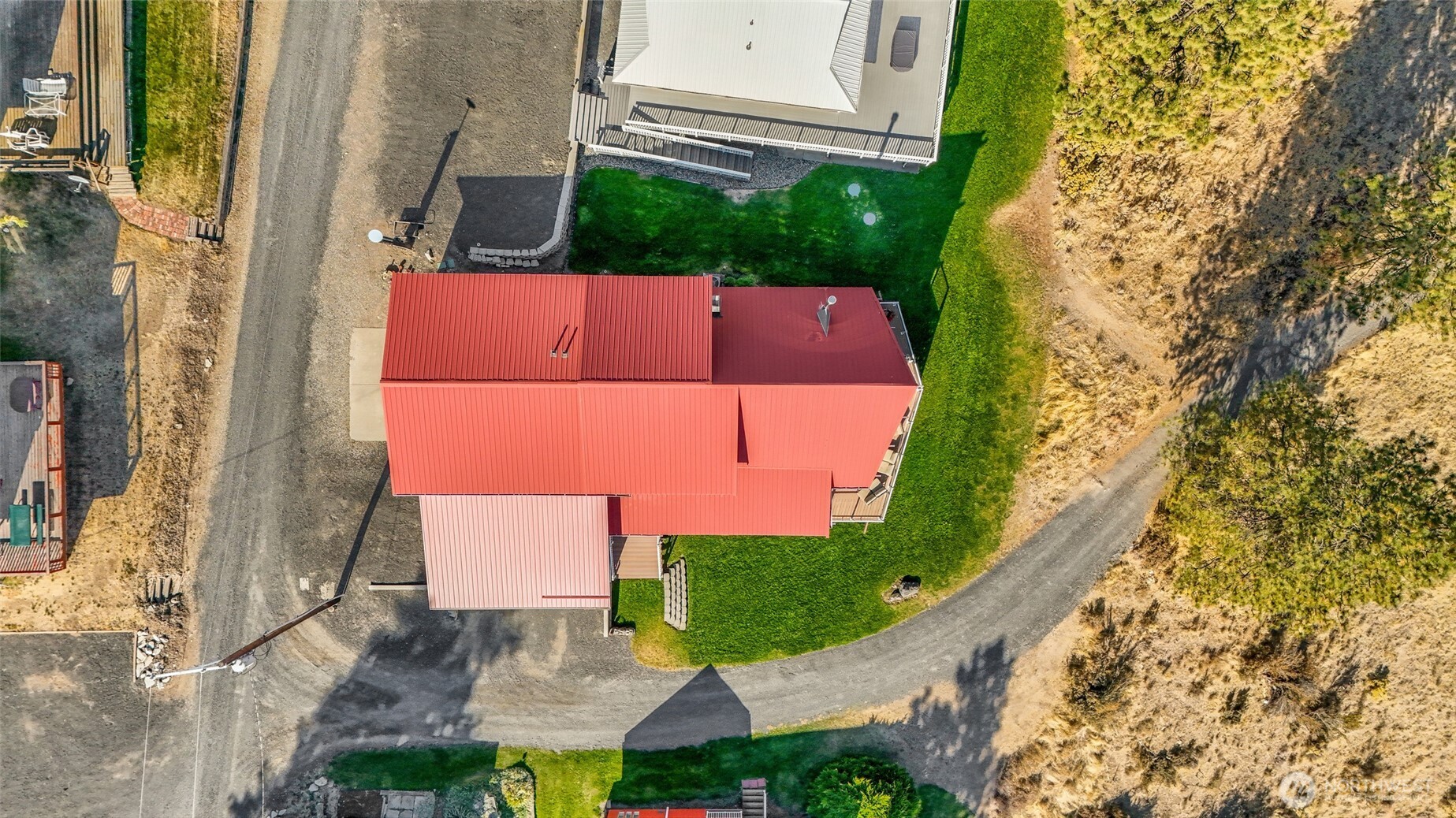 45220 Rantz Park Lane North Wilbur, WA 99185 - Photo 5 of 39 an aerial view of a house with a garden and trees