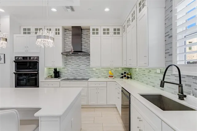 a bedroom with a bed and wall painting