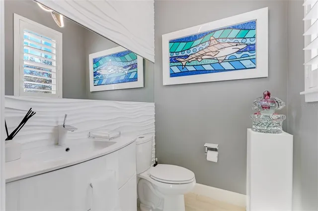 a bathroom with a sink double vanity and a shower