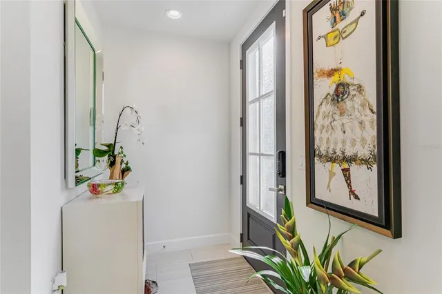 a view of a dining room with furniture and window