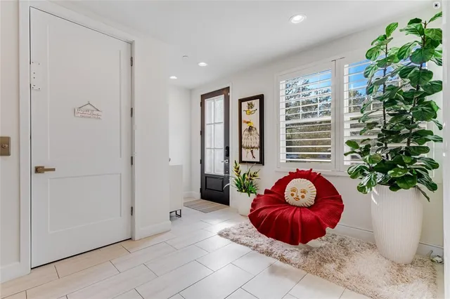 a kitchen with stainless steel appliances a sink counter space and cabinets