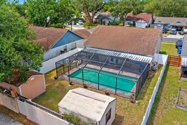 a view of a house with swimming pool