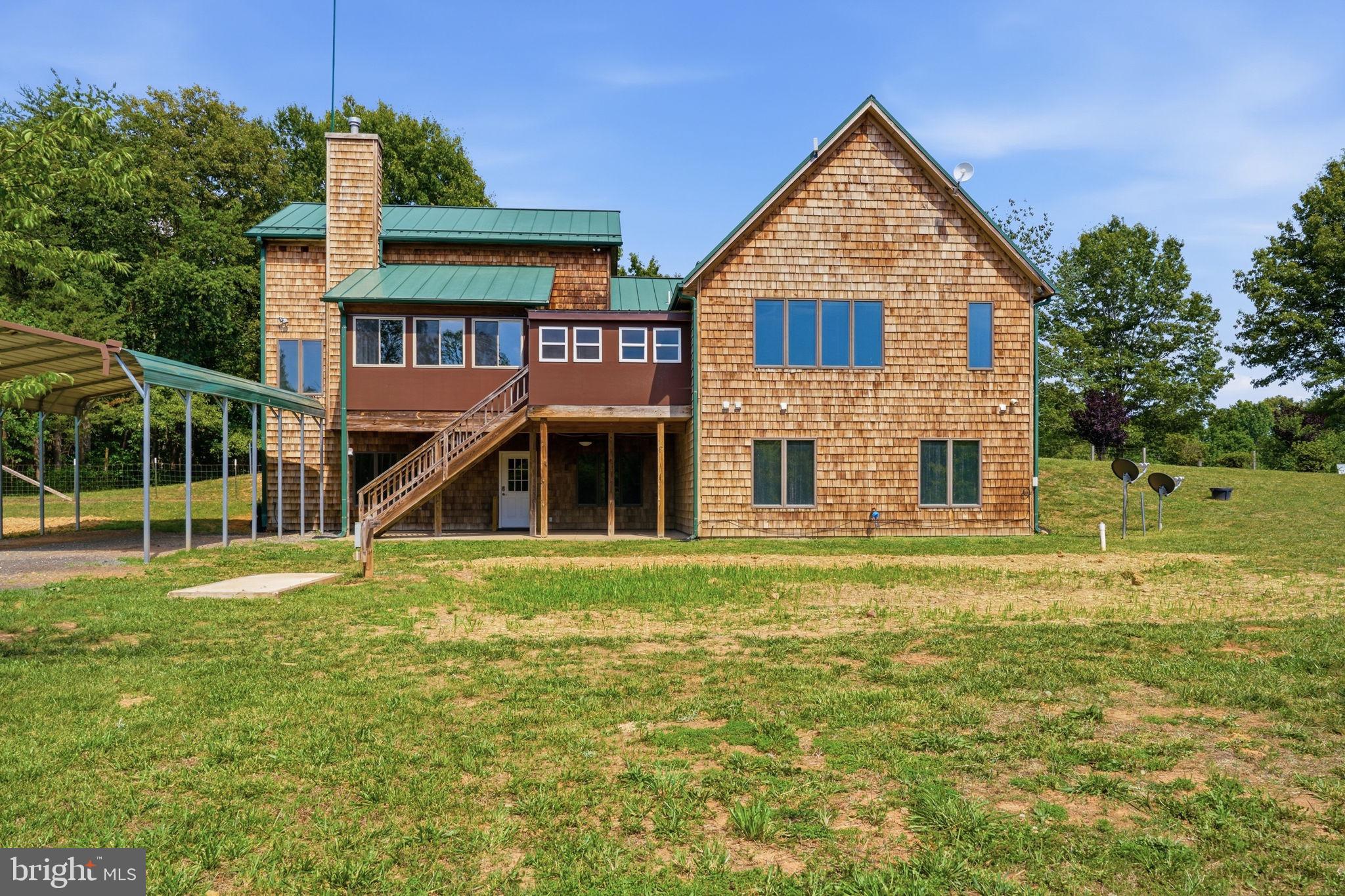 7522 Stubbs Bridge Road Spotsylvania, VA 22551 - Photo 34 of 60 a view of a house with a yard