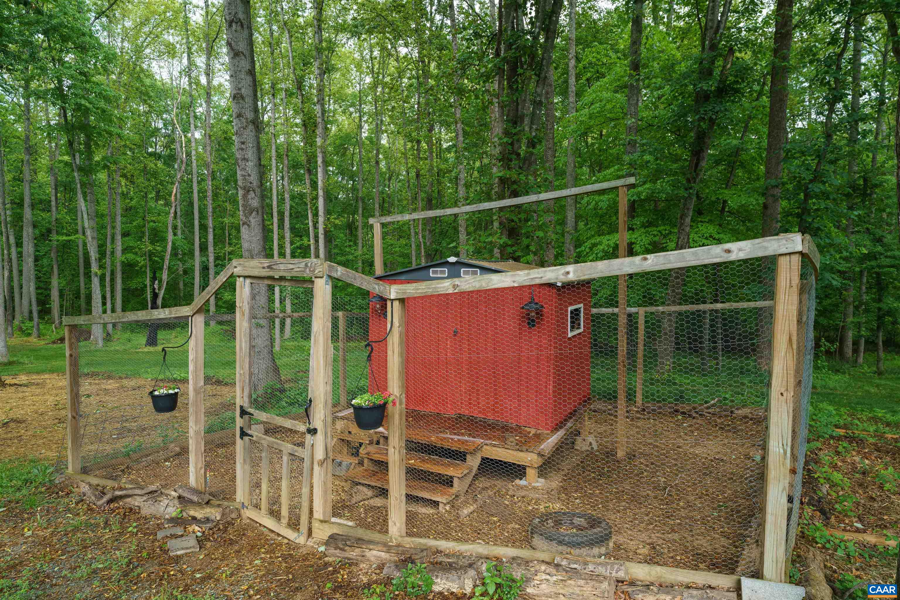 1760 Haden Martin Road Palmyra, VA 22963 - Photo 49 of 51 a view of a wooden deck with a backyard