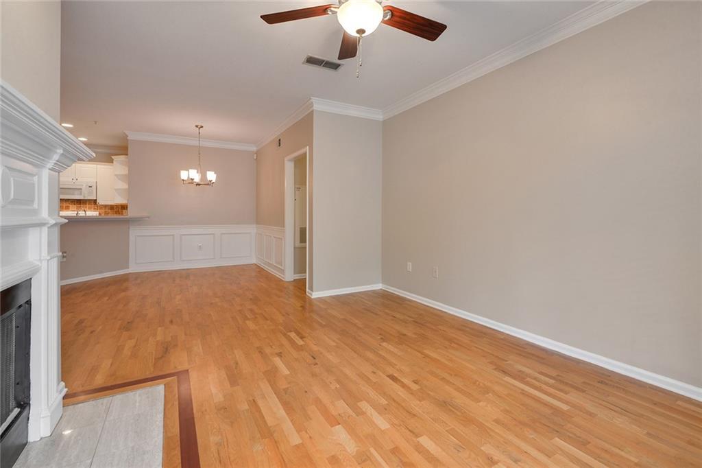 2400 Cumberland Parkway Southeast, Unit 611 Atlanta, GA 30339 - Photo 13 of 26 a view of an empty room and kitchen view