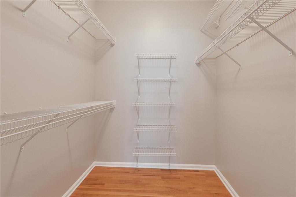 2400 Cumberland Parkway Southeast, Unit 611 Atlanta, GA 30339 - Photo 21 of 26 a view of a room with racks on the wall
