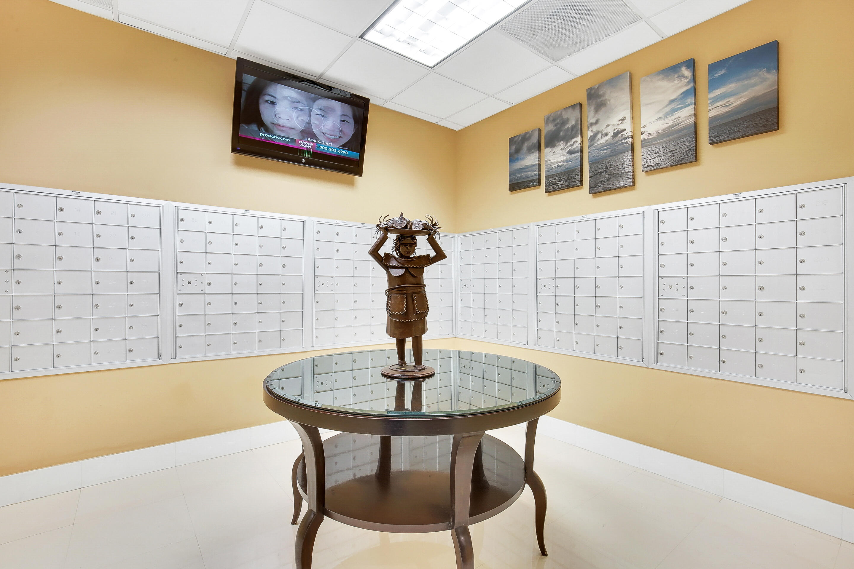 610 Clematis Street, Unit 736 West Palm Beach, FL 33401 - Photo 11 of 37 a view of a dining room with furniture and wooden floor