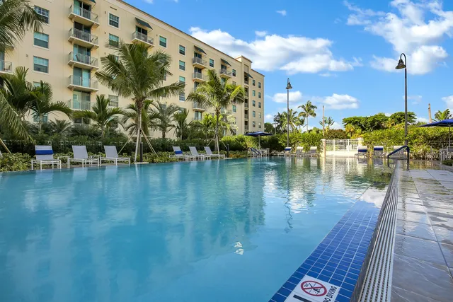 a view of swimming pool with outdoor seating
