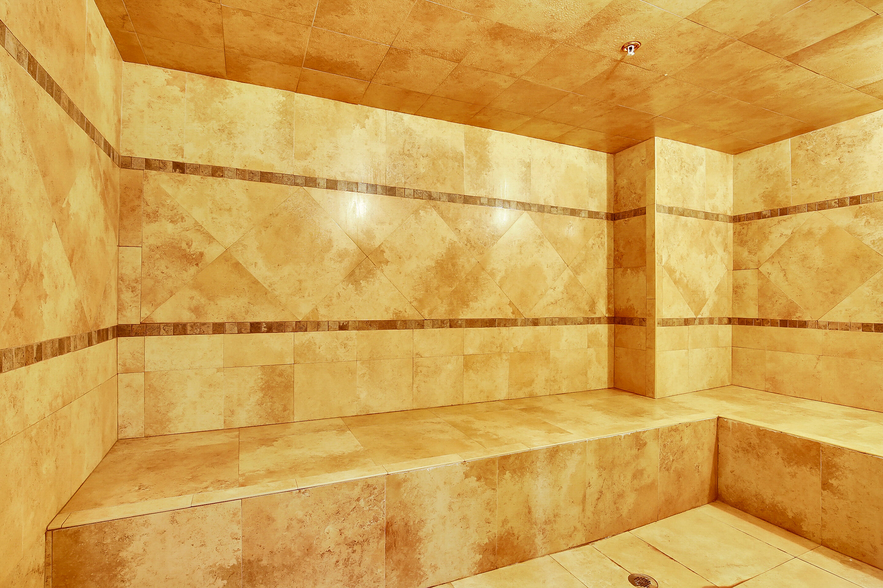 610 Clematis Street, Unit 736 West Palm Beach, FL 33401 - Photo 18 of 37 a bathroom with a bathtub and shower