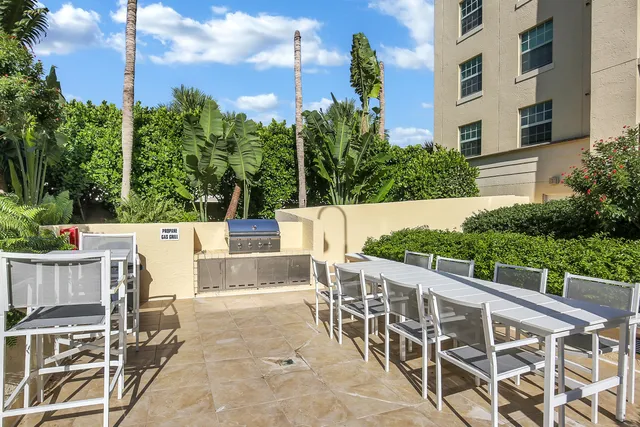 a view of outdoor kitchen and patio