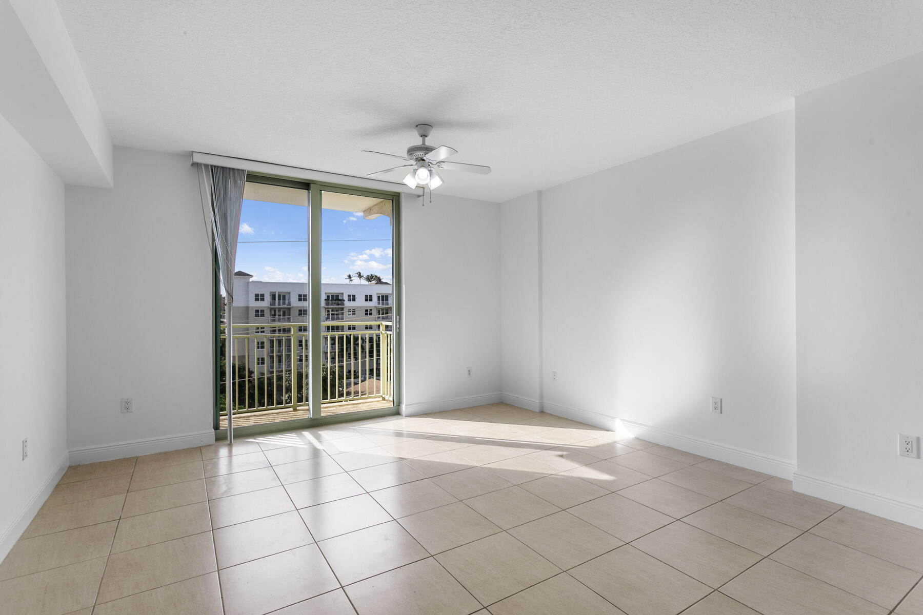 610 Clematis Street, Unit 736 West Palm Beach, FL 33401 - Photo 22 of 37 a view of an empty room with a window
