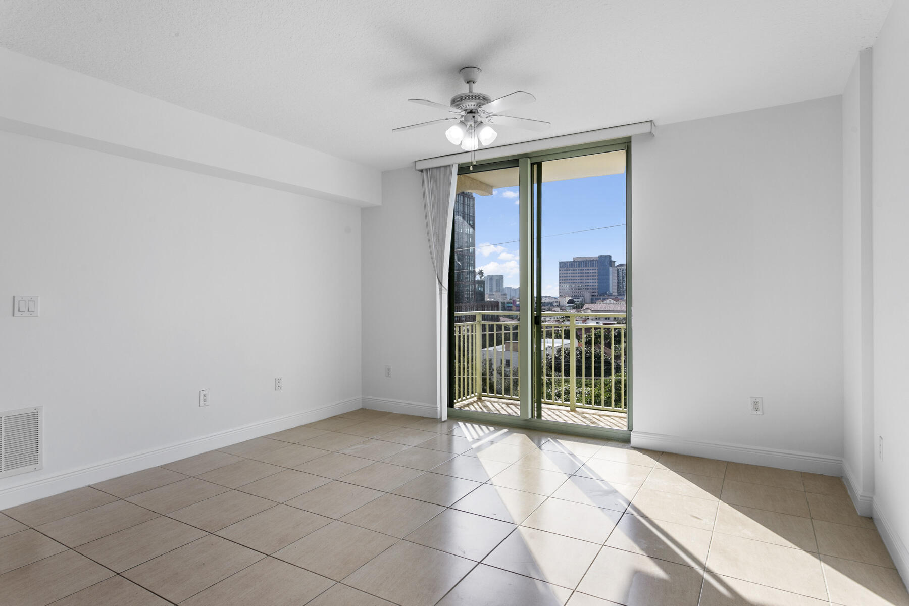 610 Clematis Street, Unit 736 West Palm Beach, FL 33401 - Photo 24 of 37 a view of an empty room with glass door
