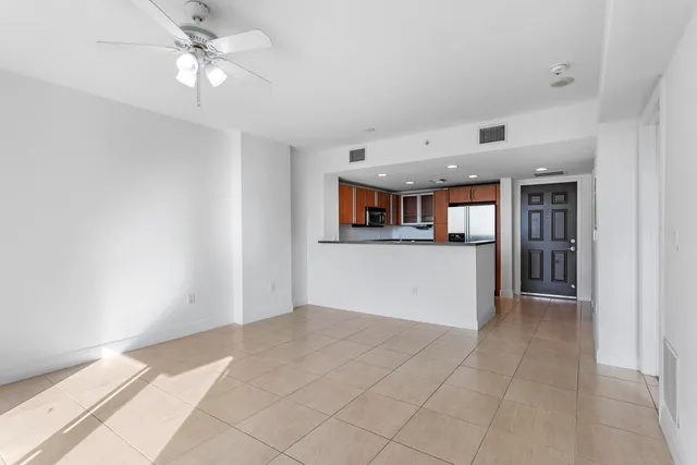 a view of an empty room with a window