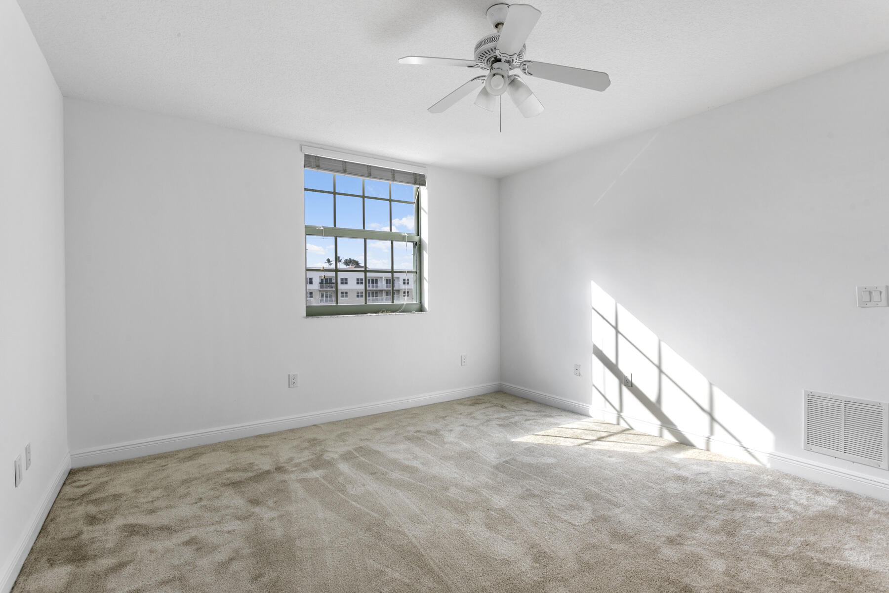 610 Clematis Street, Unit 736 West Palm Beach, FL 33401 - Photo 28 of 37 a view of an empty room with a window