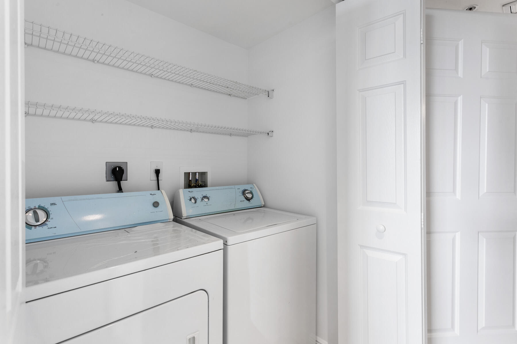 610 Clematis Street, Unit 736 West Palm Beach, FL 33401 - Photo 29 of 37 a utility room with dryer and washer