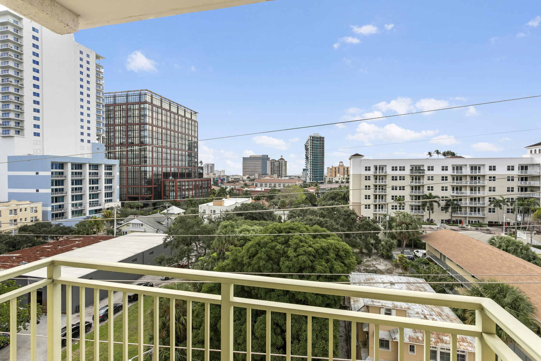 610 Clematis Street, Unit 736 West Palm Beach, FL 33401 - Photo 33 of 37 a view of a city with tall buildings