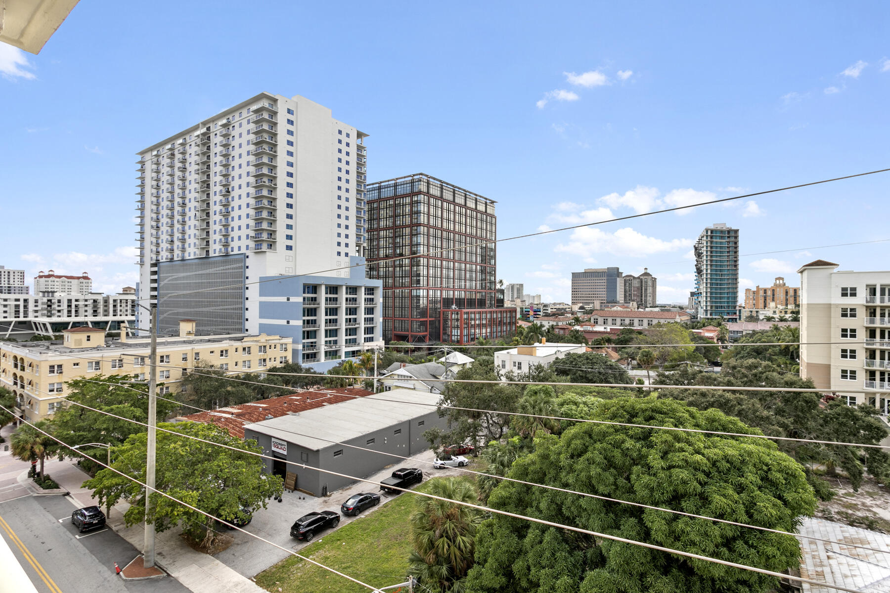 610 Clematis Street, Unit 736 West Palm Beach, FL 33401 - Photo 34 of 37 a view of a city that has tall buildings