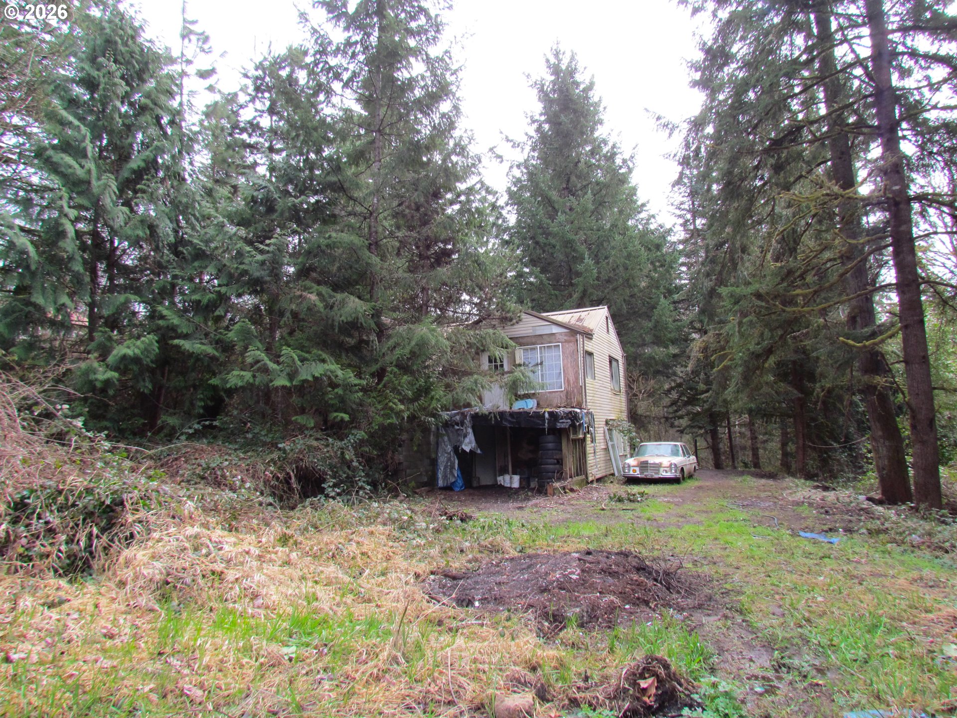31191 New Kirk Road Scappoose, OR 97056 - Photo 3 of 10 a front view of a house with a yard
