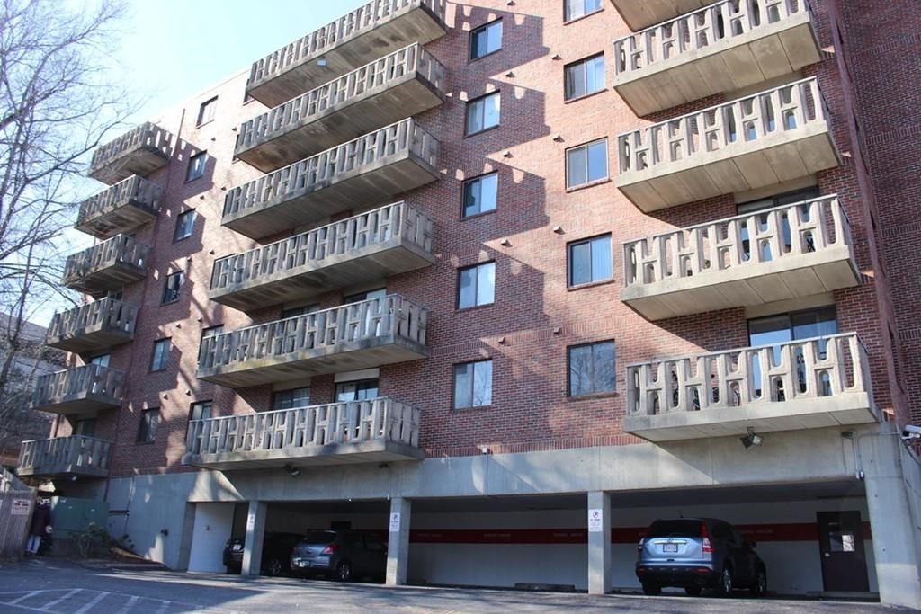 10 Main Street, Unit 507 Framingham, MA 01702 - Photo 1 of 17 a front view of multi story residential apartment building