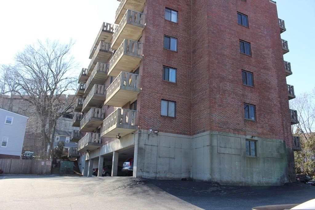 10 Main Street, Unit 507 Framingham, MA 01702 - Photo 2 of 17 a view of a building with a street