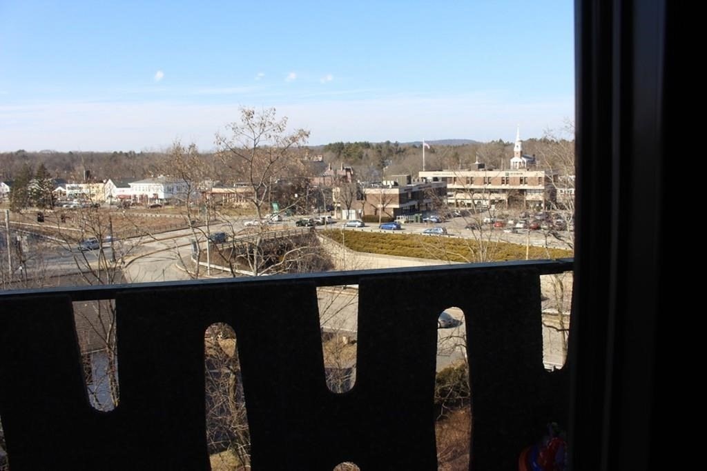 10 Main Street, Unit 507 Framingham, MA 01702 - Photo 3 of 17 a view of a city from a terrace