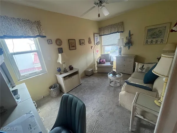 a room with furniture and a window