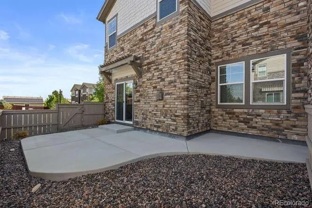 a view of a house with a bench