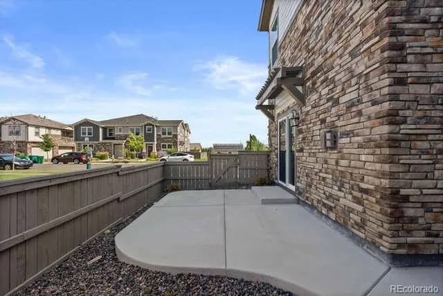 a view of balcony with furniture