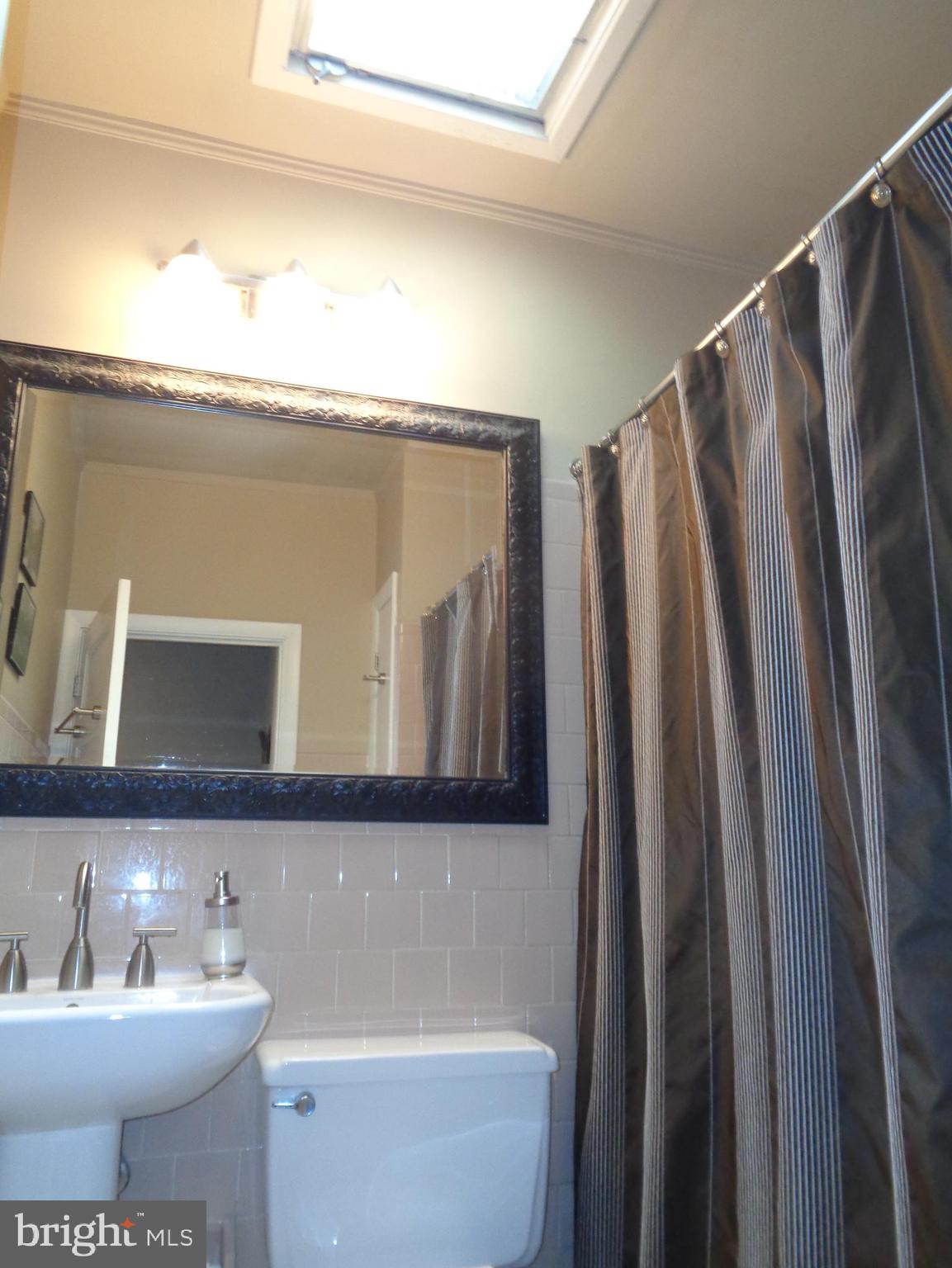 4024 Falls Road Baltimore, MD 21211 - Photo 38 of 68 Upstairs Bath w/ Skylight