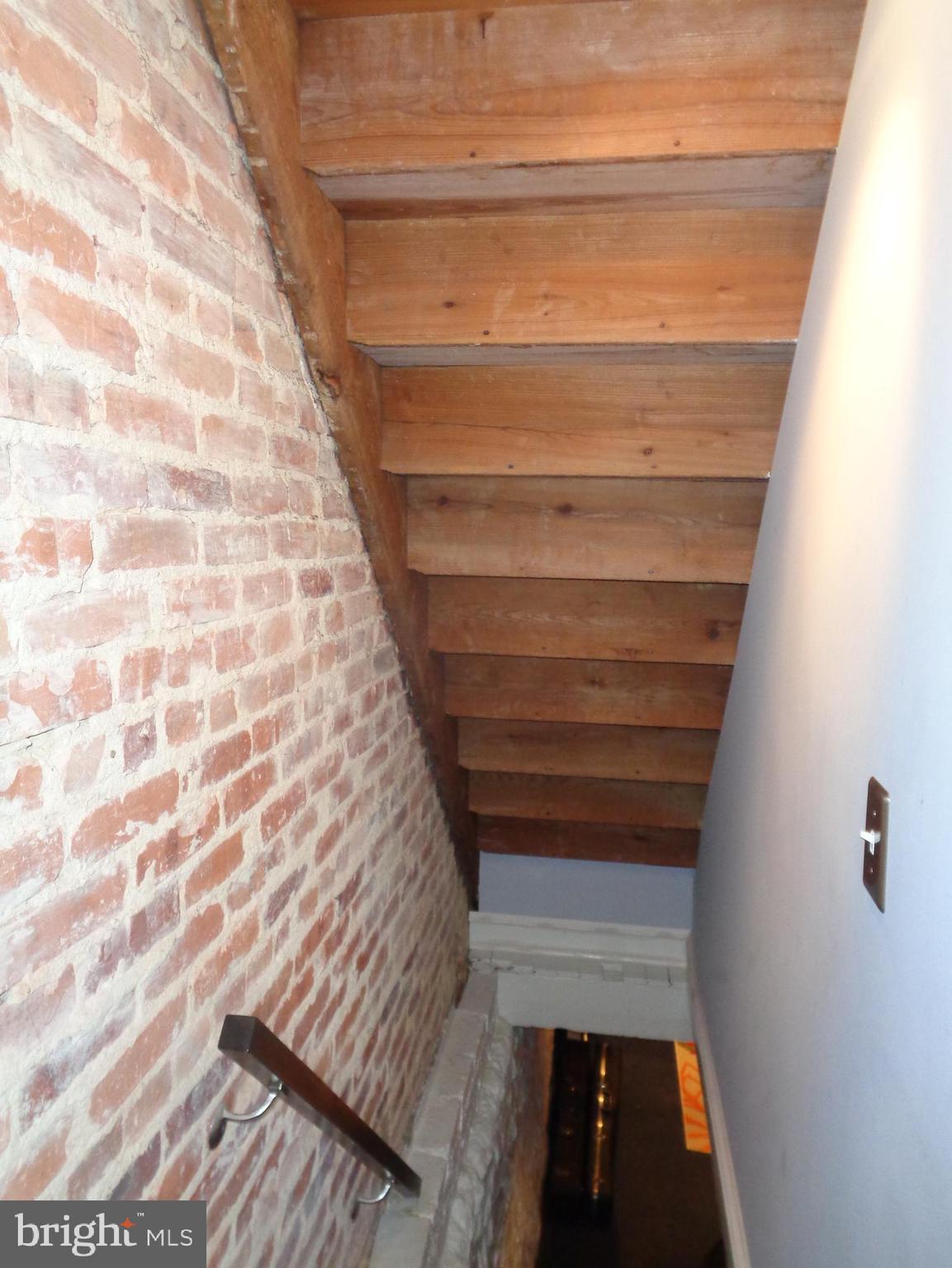 4024 Falls Road Baltimore, MD 21211 - Photo 52 of 68 Stairs to Lower Level, Exposed Brick