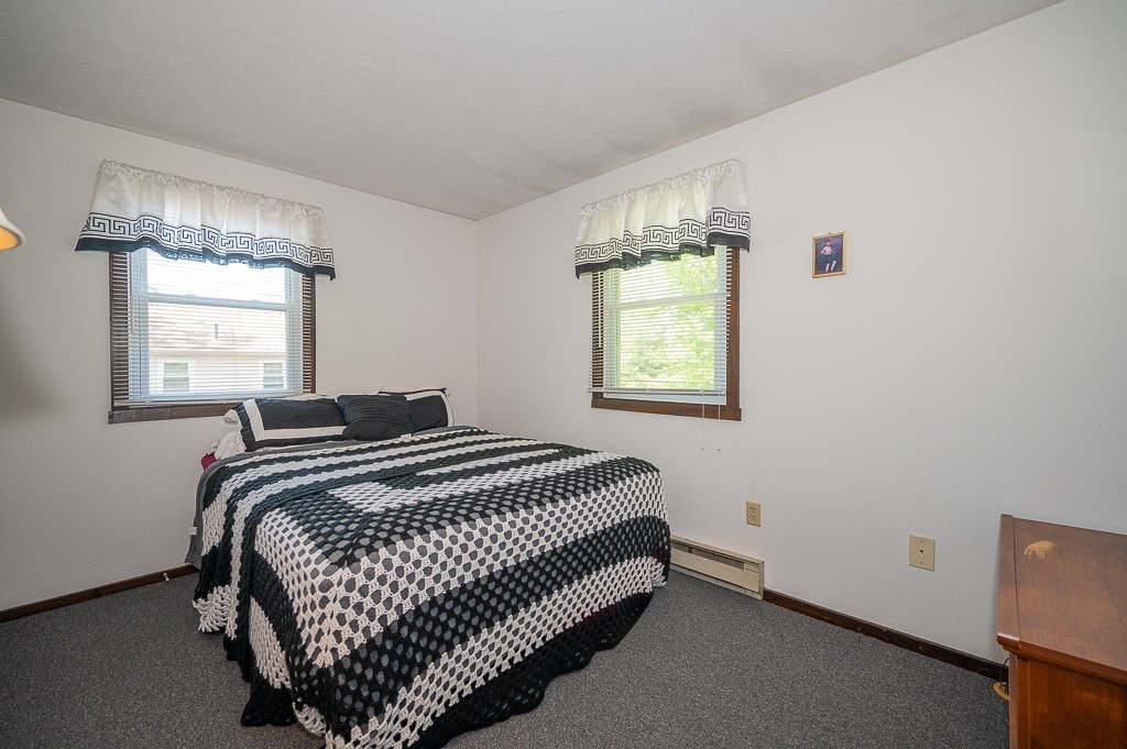 25 Agate Avenue Worcester, MA 01604 - Photo 11 of 34 a bedroom with a bed and window