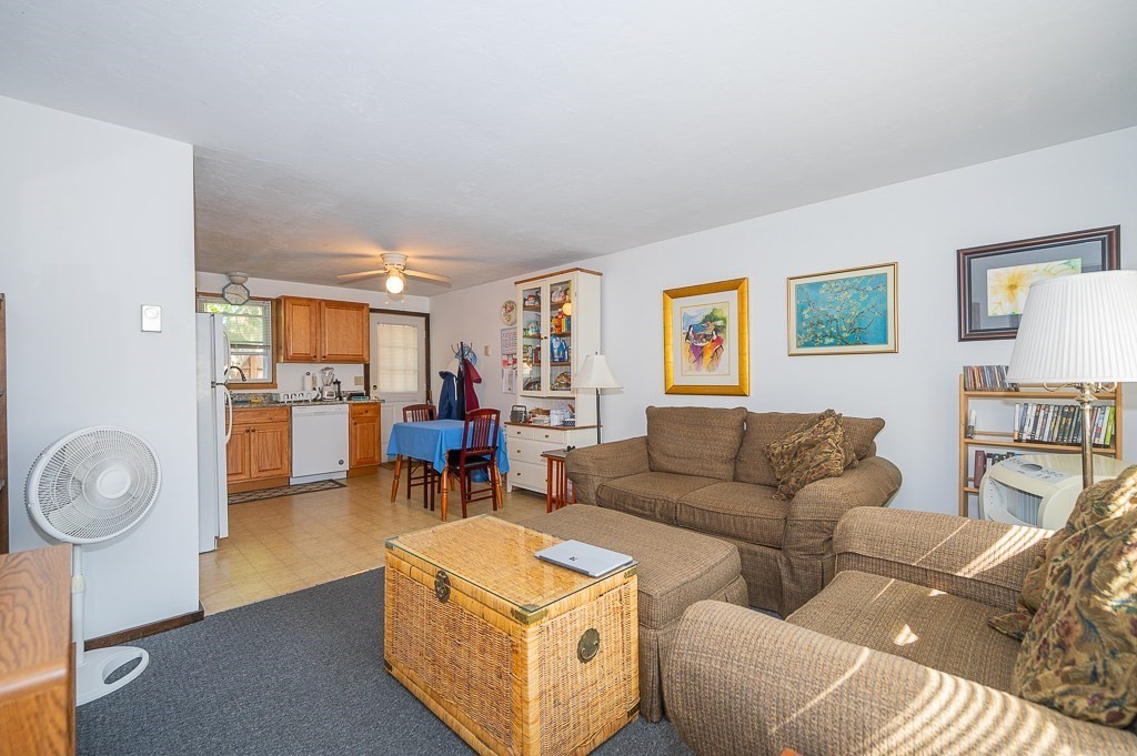 25 Agate Avenue Worcester, MA 01604 - Photo 18 of 34 a living room with furniture and a table