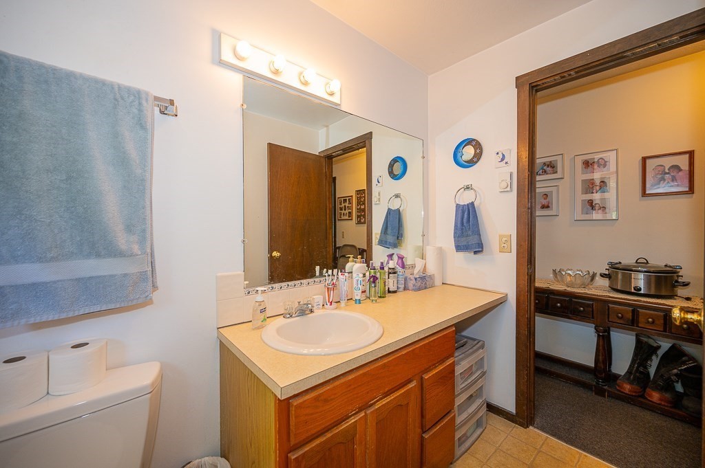 25 Agate Avenue Worcester, MA 01604 - Photo 20 of 34 a bathroom with a sink and a mirror