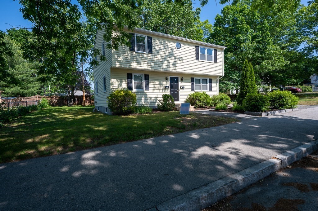 25 Agate Avenue Worcester, MA 01604 - Photo 2 of 34 a front view of a house with a yard