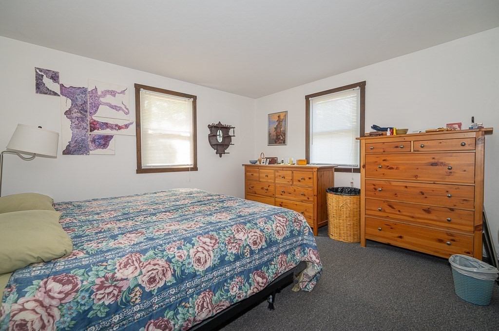 25 Agate Avenue Worcester, MA 01604 - Photo 22 of 34 a bedroom with a bed and a window