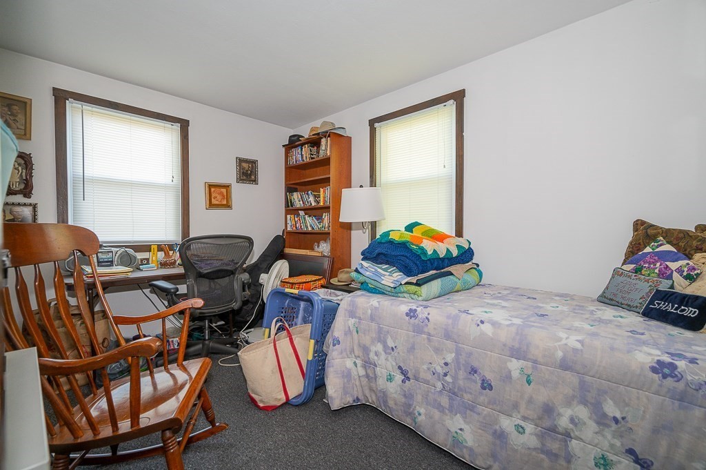 25 Agate Avenue Worcester, MA 01604 - Photo 23 of 34 a bedroom with a bed and a window