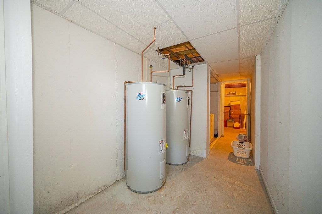25 Agate Avenue Worcester, MA 01604 - Photo 25 of 34 a view of a room with refrigerator and mirror