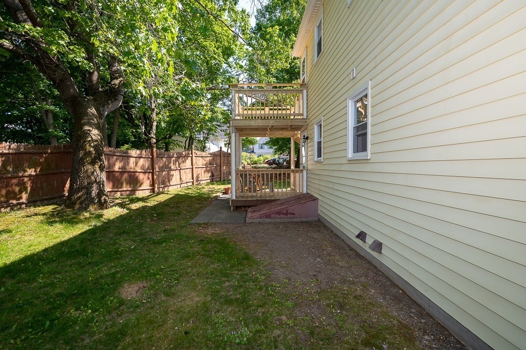 25 Agate Avenue Worcester, MA 01604 - Photo 32 of 34 a view of a backyard with a garden