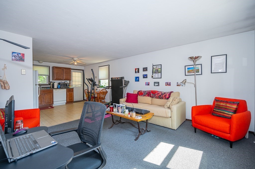 25 Agate Avenue Worcester, MA 01604 - Photo 8 of 34 a living room with furniture and a flat screen tv
