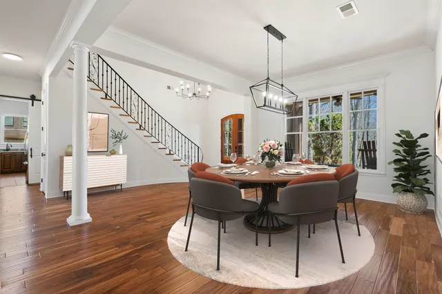 a kitchen with stainless steel appliances granite countertop a stove a sink dishwasher and a refrigerator