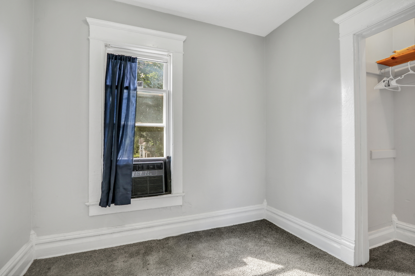 725 18th Street North Chicago, IL 60064 - Photo 27 of 32 an empty room with a window